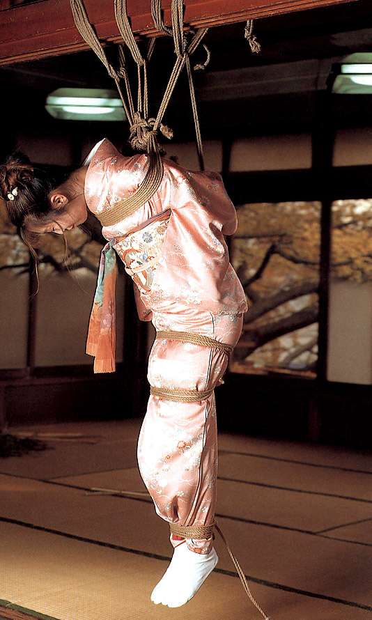 Kimono Bound with 28 photos of kimono clad girls tightly bound